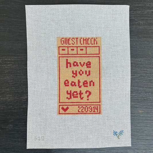Needlepoint design of guest check with text "have you eaten yet" on 18 mesh